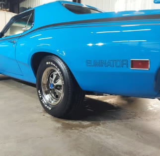 Bright blue classic Eliminator with polished paint and detailed BFGoodrich tires